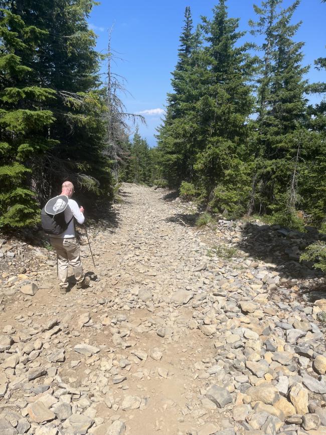 Steep hill downward with rough gravel